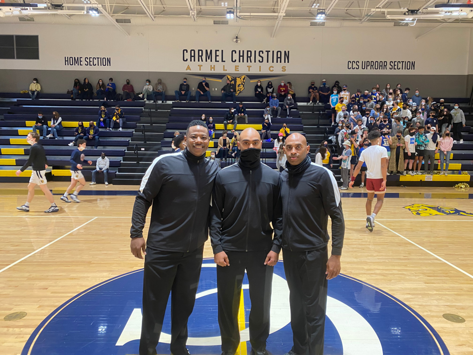 Let'em Play officials on court before a tournament game